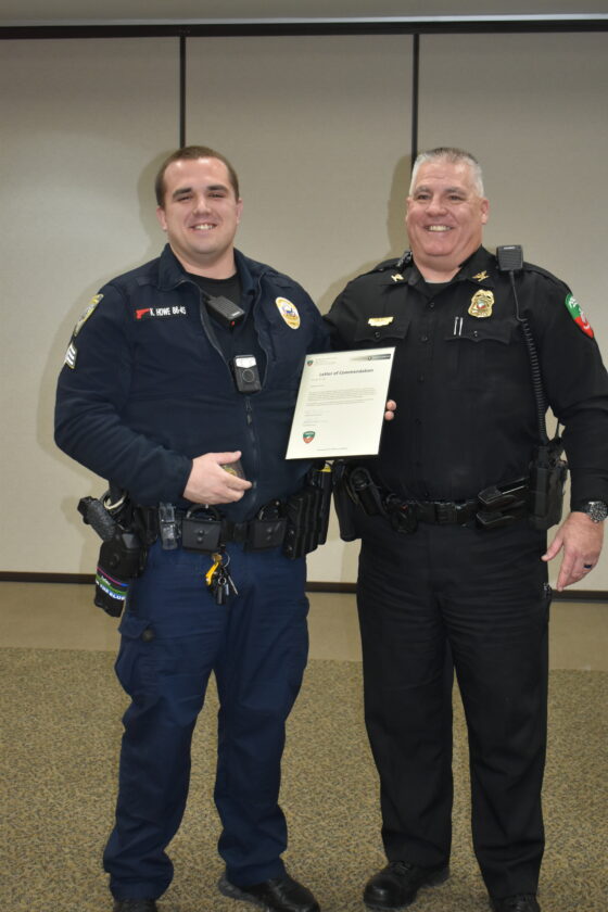 Officer Howe of Toledo PD receives from Meskwaki Tribal